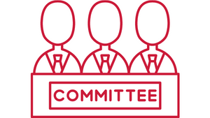 An icon of three people standing together with the word 'committee' on a sign in front of them.